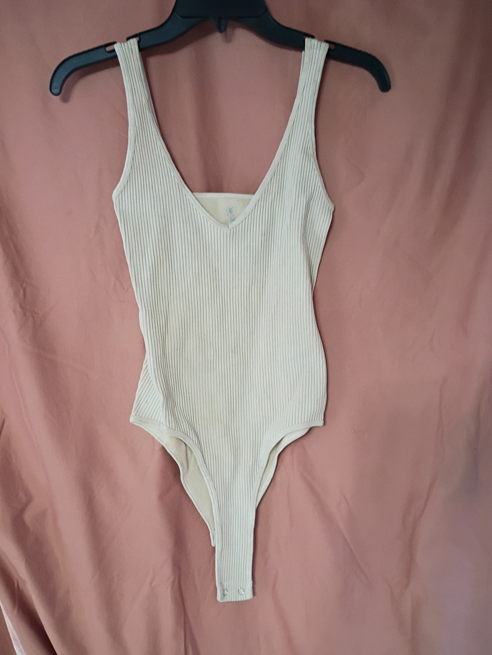 Aura Cream Ribbed V-Neck One-Piece Bodysuit